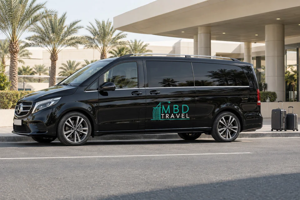 Black Mercedes-Benz Vito with MBD Travel livery at Sharjah arrivals beside luggage, visualization